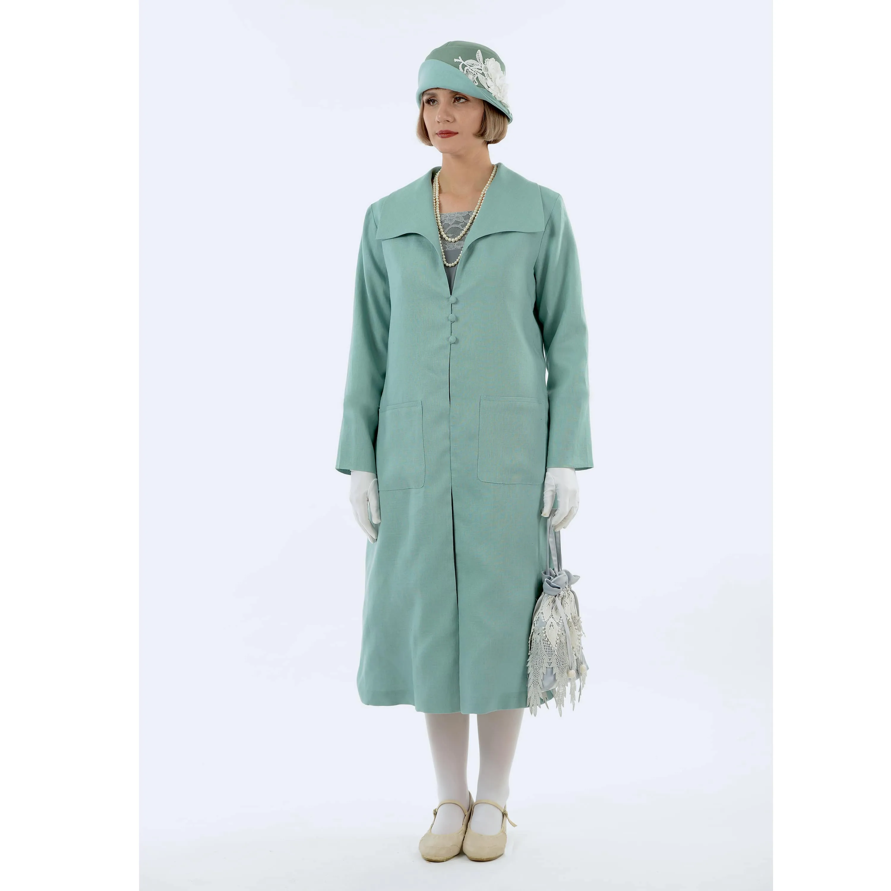 1920s fashion style linen summer coat in pastel blue with wing collar