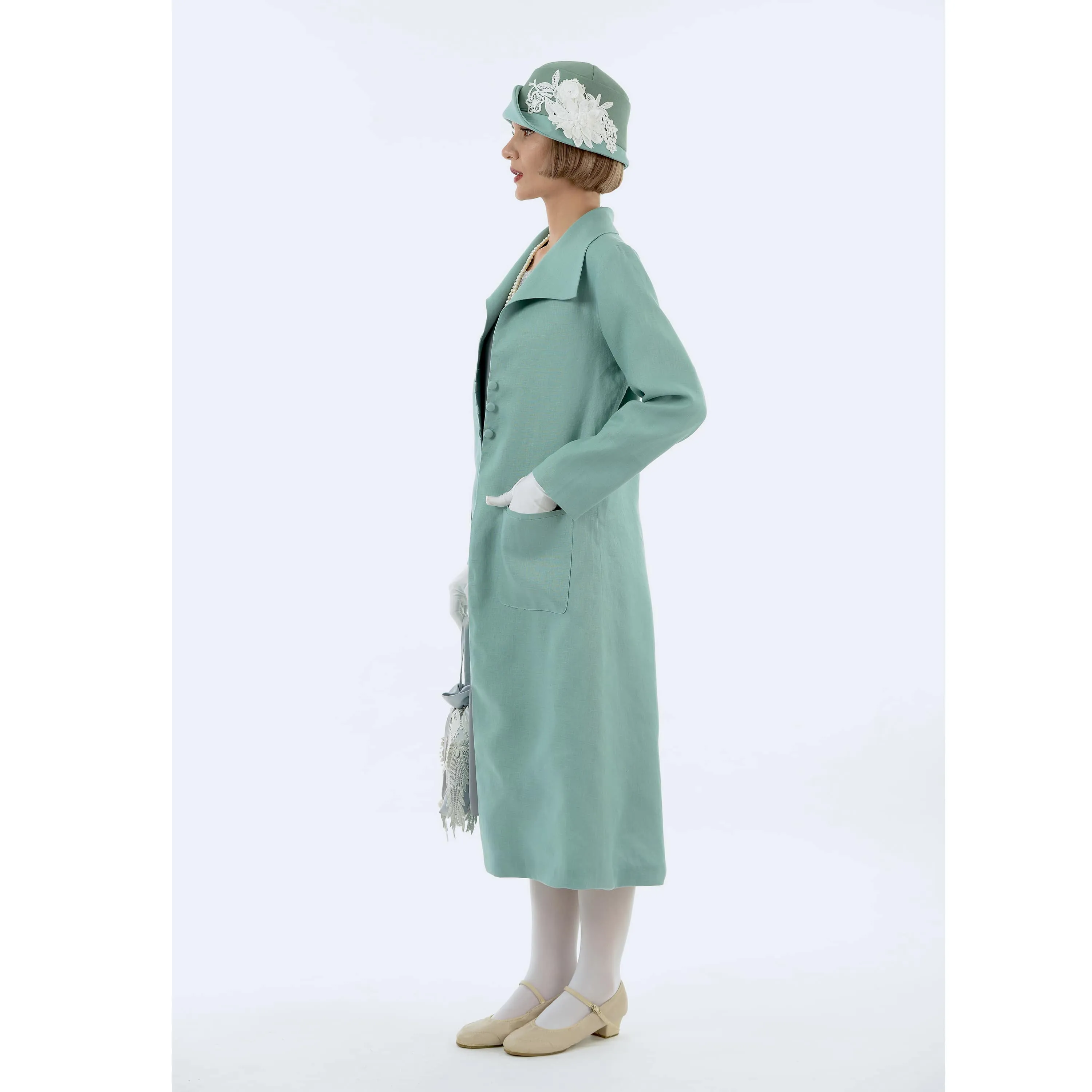 1920s fashion style linen summer coat in pastel blue with wing collar