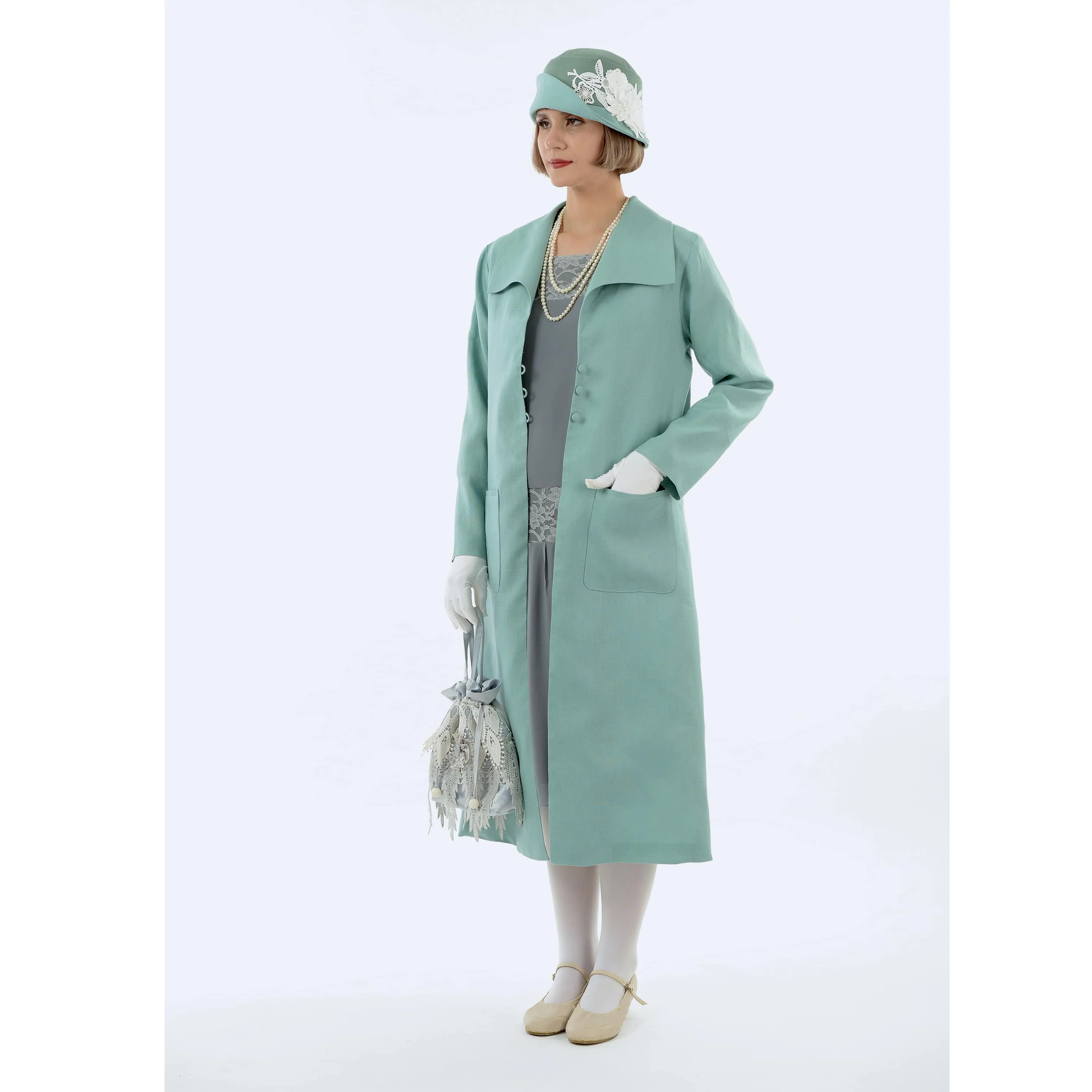 1920s fashion style linen summer coat in pastel blue with wing collar