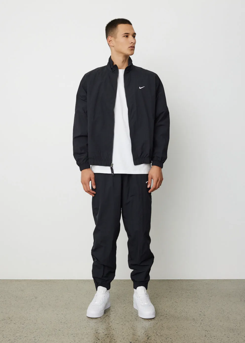 Solo Swoosh Woven Trackpants